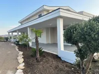 Modern villa with pool, sea and country views