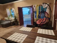 Charming 2-Bedroom Retreat with AC, Sea & Mountain Views, Steps from Downtown!