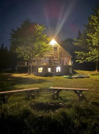 Relaxing Cedar Log Cottage on Bras d'Or Lake over 300 Ft Private Beach & Kayaks