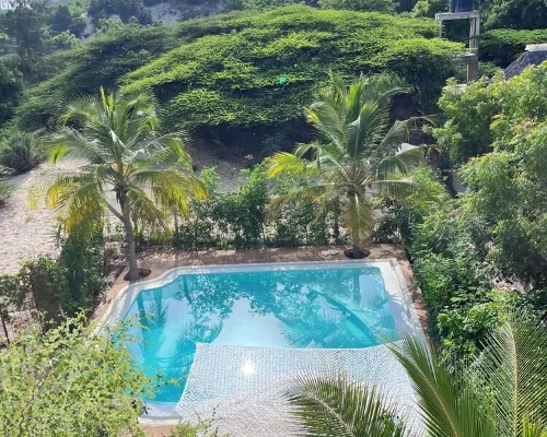 Dive in to our pool and feel the breeze at Mbibo House in the Shela sand dunes Hotels in Shela