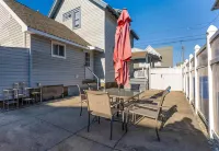 Private Backyard and Modern Kitchen - Charming Coastal Haven