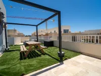 Sannat Penthouse Retreat Hot Tub Outdoor Lounge Hotels in Sannat