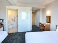Green Rich Hotel Aso Kumamoto Airport (Artificial Hot Spring Futamata Yunohana) - Parkplatz