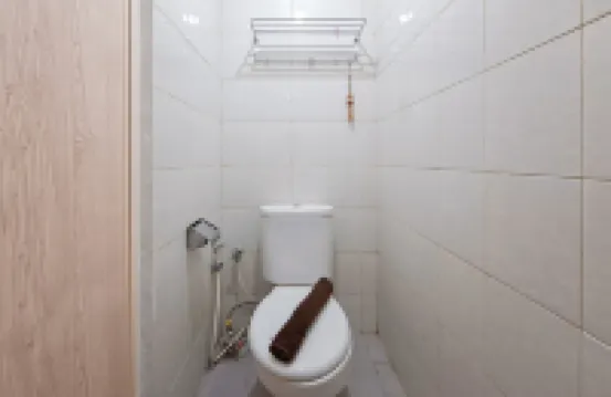 Basic Studio Apartment near KRL Station at Poris 88 By Travelio