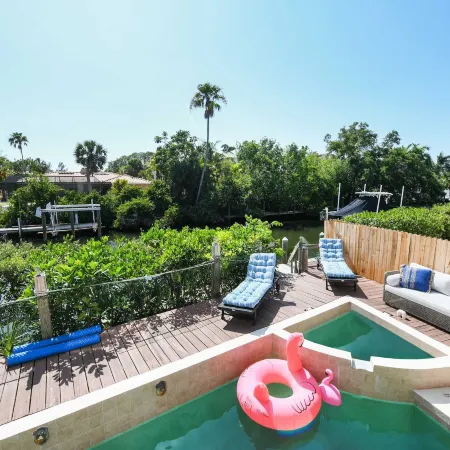Canal-front Sleeps 10 Pool Spa Private Dock