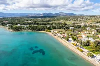 AG Stone Home - Idyllic Beachside Villa in Isthmia - Villas