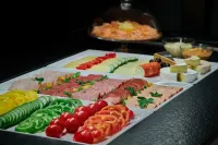 施沃澤阿德勒因斯布魯克酒店 - 早餐
