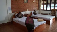 Mekong Paradise Resort Hotels near Golden Buddha