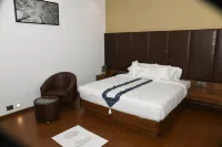 JP Airport Hotel Kannur Hotels near Njattuvayal Forest
