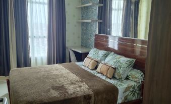 Just Cozy Apartment (1 Br Borneo Bay City)