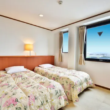 Business Hotel Kogashima Отели рядом с достопримечательностью «Ōmura-kō»