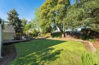 Stylish Escape - Chic & Cozy with Relaxing Backyard Hotels near Lowe's Garden Center