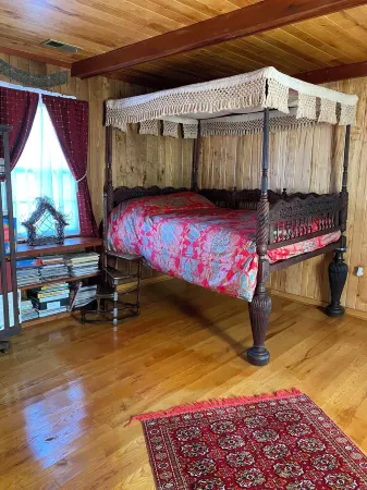 Charming Log Cabin Retreat with Flower Garden