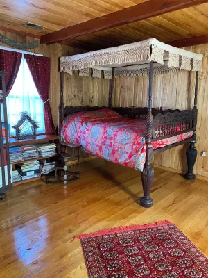 Charming Log Cabin Retreat with Flower Garden