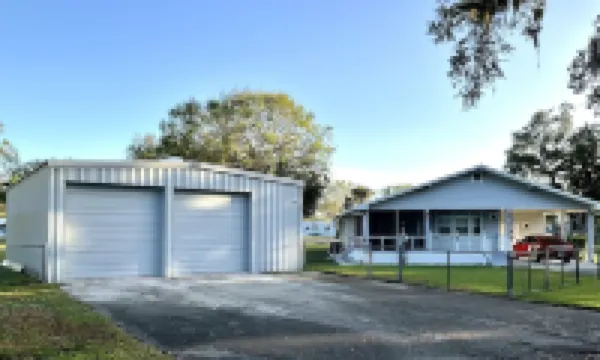 Green Acres! - Spacious secure home with ample boat parking for fishing & fun!