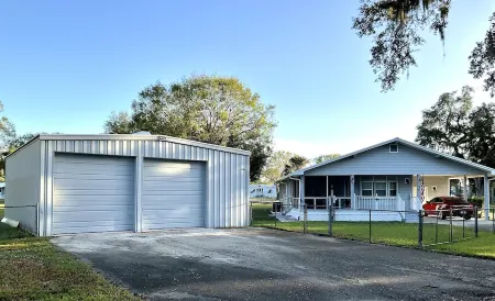 Green Acres! - Spacious secure home with ample boat parking for fishing & fun!