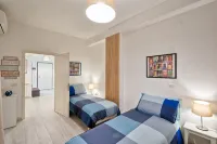 Large apartment between beach and city- With parking and private beach.