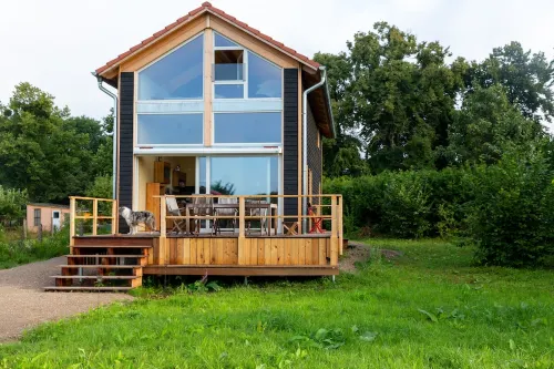 Vacation home with private sauna and private access/jetty to the Peene Hotels in Neukalen