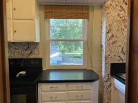 Historic Steckel carriage house with picturesque landscaping