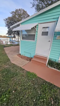 Lake front cozy quiet cottage with dock!