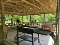 Beautiful 4 unit lodge w/ Hot tub, WiFi, fire pits &  pavilion area with grills