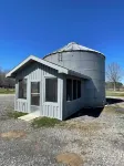 Soybean Bin Cozy Grain Bin retreat on a mini working farm.