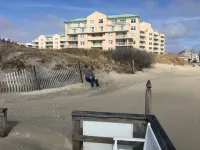 Two bedroom condo with deck overlooking the ocean. Private beach!