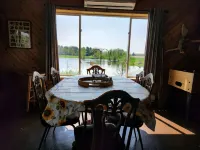 Peacefully secluded cabin on a small private lake with 55 Acres