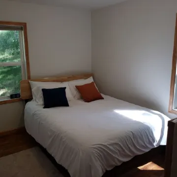 Remodeled home in the woods, just past city limits. With horse pasture nearby!