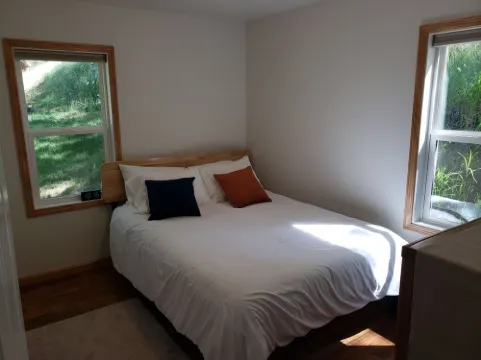 Remodeled home in the woods, just past city limits. With horse pasture nearby!