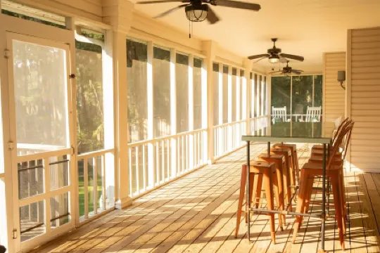 Elegant WATERFRONT home with private boat ramp/dock, elevator, & unmatched view!