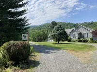 Huge deck, grill, stunning mountain views. EV charging station available.