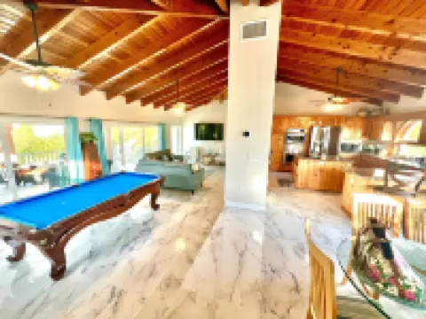 “RENOVATED Gorgeous House with ocean views from balconies, with Hot Tub & Pool”