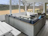 Waterfront, gorgeous sunsets, sandy beach, dogs allowed.