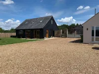 Quiet setting with secure gated parking, children's play area & farm animals