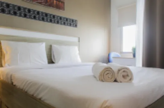 Bright Studio Apartment at Springwood Residence