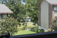 Balcony View and Golf Course Access - Stylish Escape Hotels in Oliver Township
