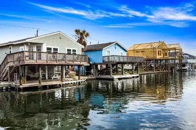 Relaxing waterfront home with private hot tub, grill, & furnished outdoor areas