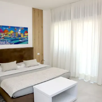 Lo Studio di Viale Lo Re Camere & Caffe’