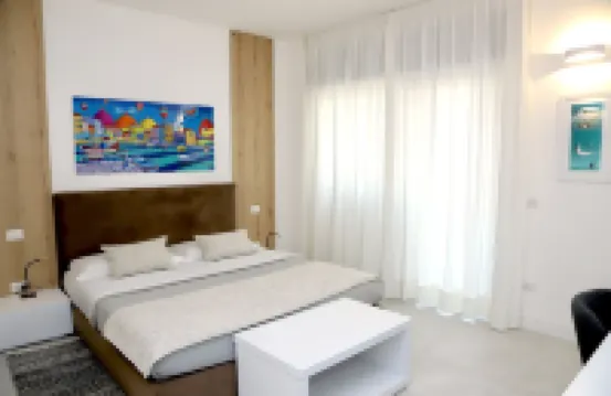 Lo Studio di Viale Lo Re Camere & Caffe’