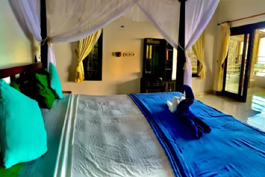 Titi Sedana Homestay Отели рядом с достопримечательностью «Lipah Beach»