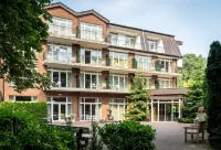 Waldhotel Tannenhäuschen Hotel dekat Heimathaus Mussum