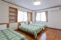 Kariyushi Condominium Resort Sea Side House Hotels in Nago