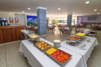 Hotel Axis Inn by Geh Suites - breakfast