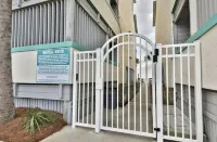 Beachfront corner unit with breathtaking ocean views!