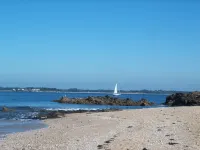 In a green setting close to the ocean