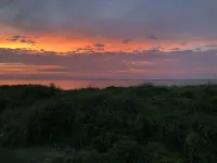 Beach Front on the Bay in Our Rustic, Pet Friendly Cottage 4 Bedroom Cottage by RedAwning Hotels in Norfolk