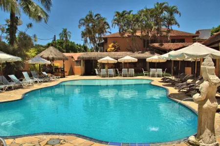 Hotel Pousada Dos Condes Отели рядом с достопримечательностью «Camping e Bar do Cacau - Praia de Santiago»