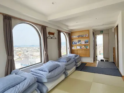 Simanami Guest House Orange No Kaze Отели рядом со станцией Станция JR Имабари