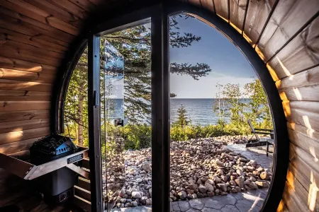 Kalliot: Lakefront Tiny A-Frame w/Barrel Sauna + EV Charger